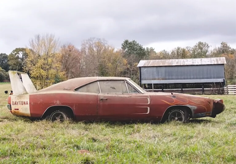 1969 Dodge Charger Daytona Sits In The Field Of A Barn