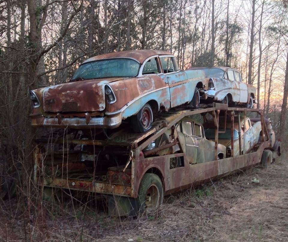 An Abandoned Car Hauler With Cars Still In It
