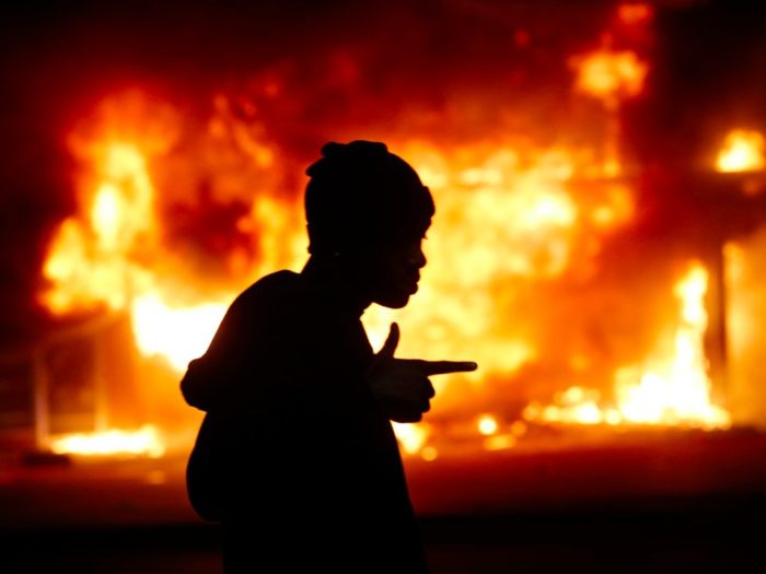 A man seen in early 2014 during rioting after a grand jury returned no indictment in the shooting of Michael Brown