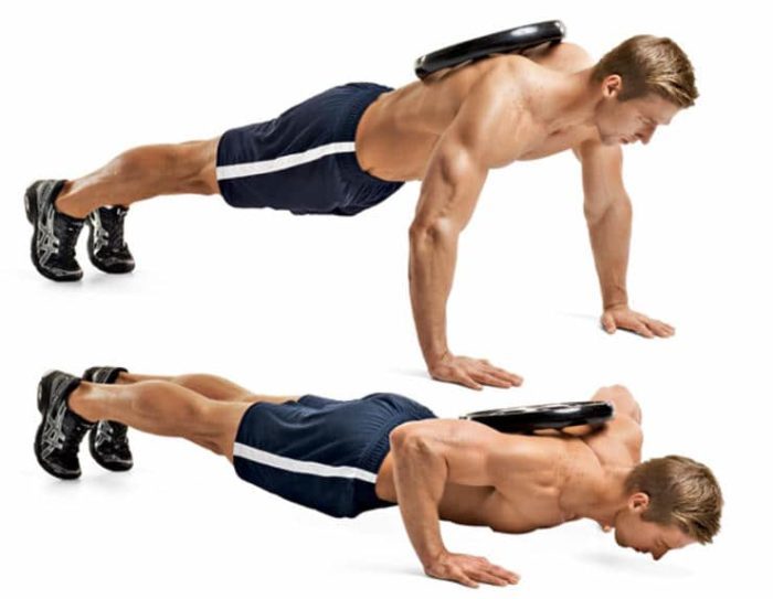 guy-doing-weighted-pushups