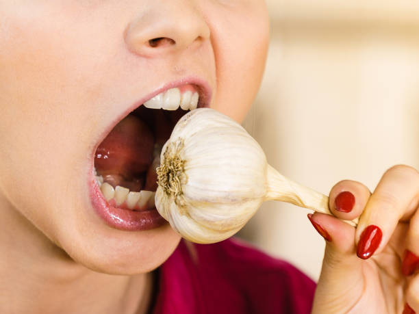 15,865 Eating Garlic Stock Photos, Pictures & Royalty-Free Images - iStock