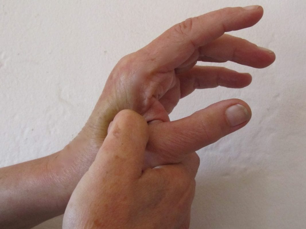 stimulating pressure points on the hand