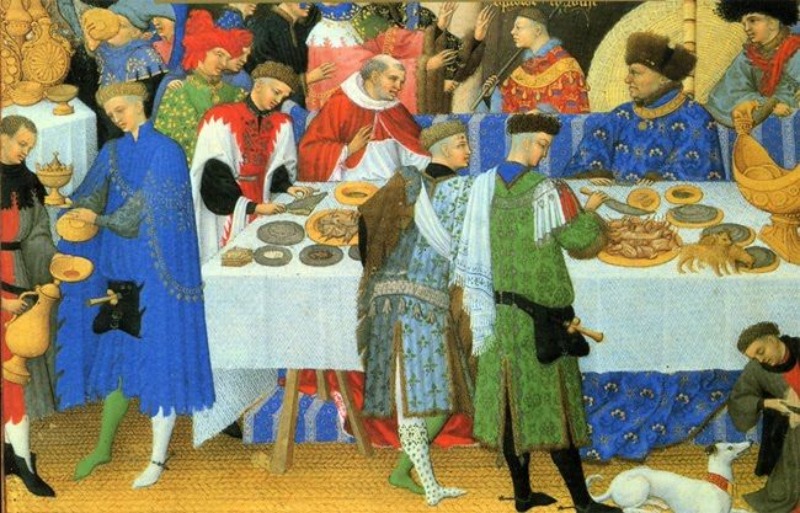 Personas pintadas alrededor de una mesa